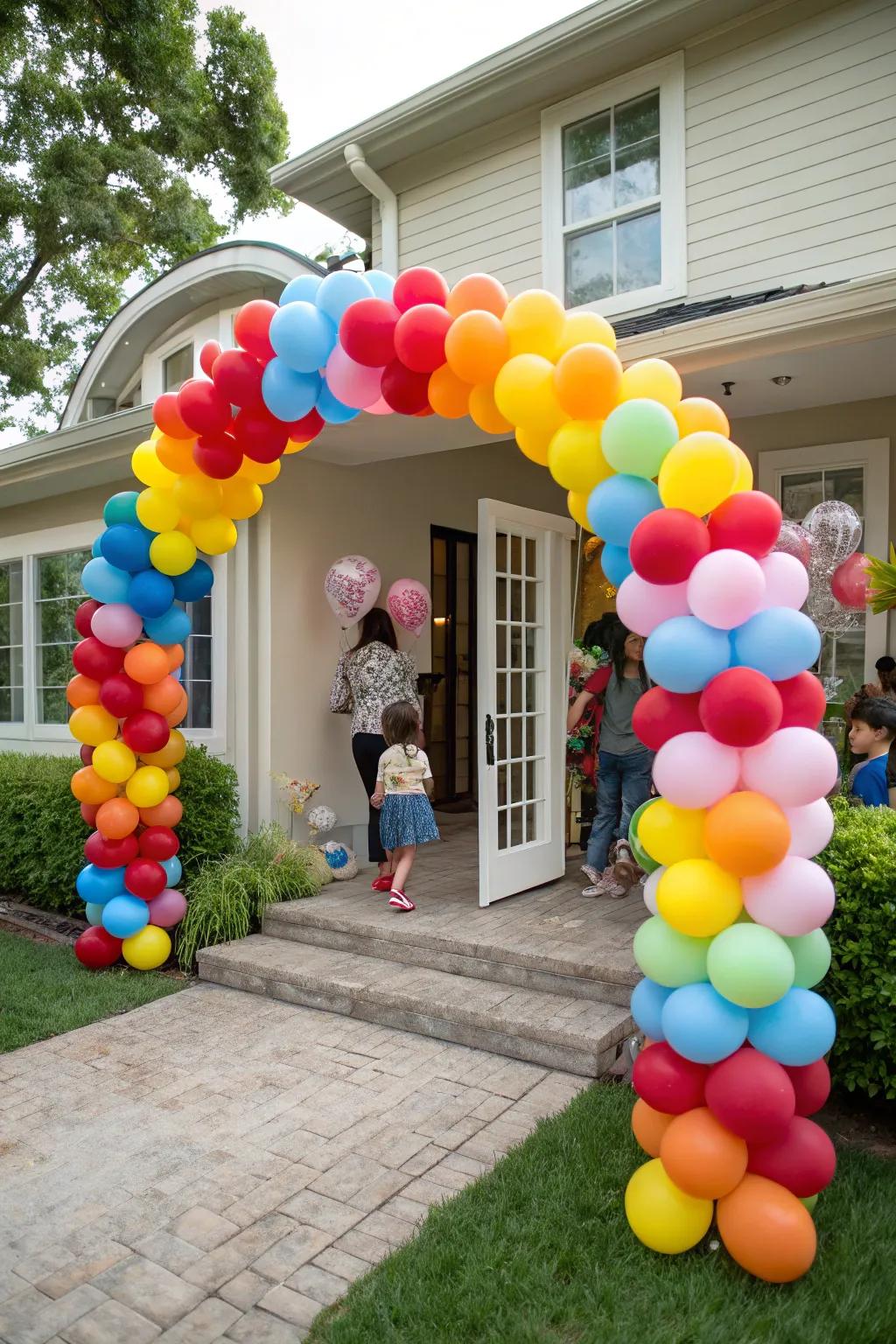 Guests are greeted by a stunning balloon arch at the party entrance.