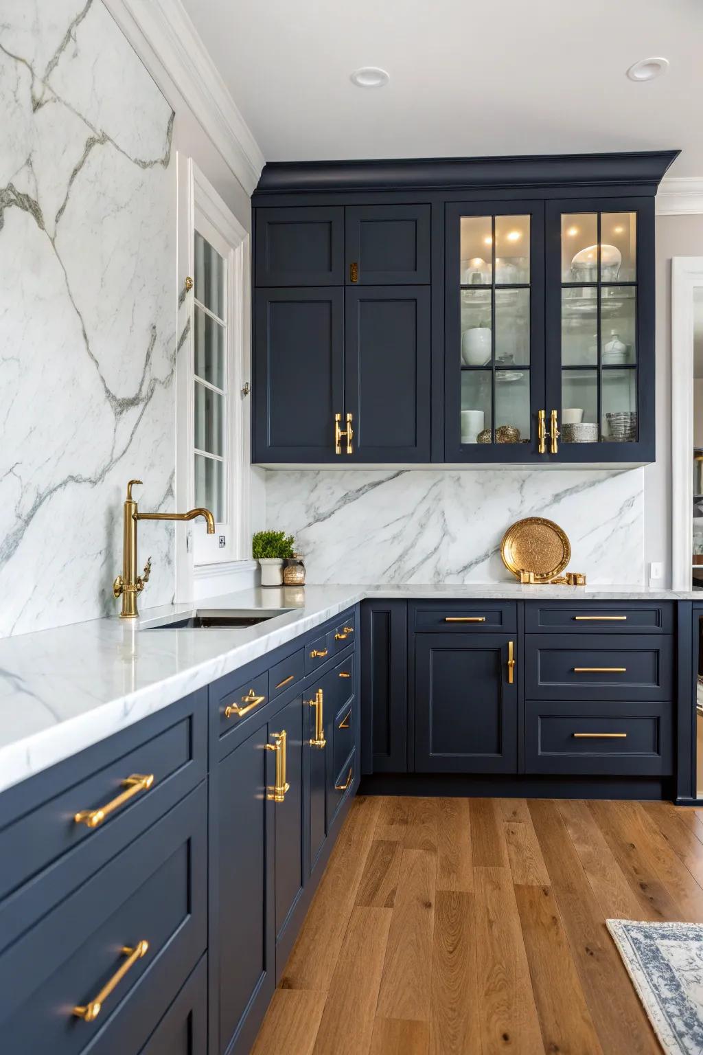 Navy blue cabinets with gold hardware create a timeless and inviting kitchen space.