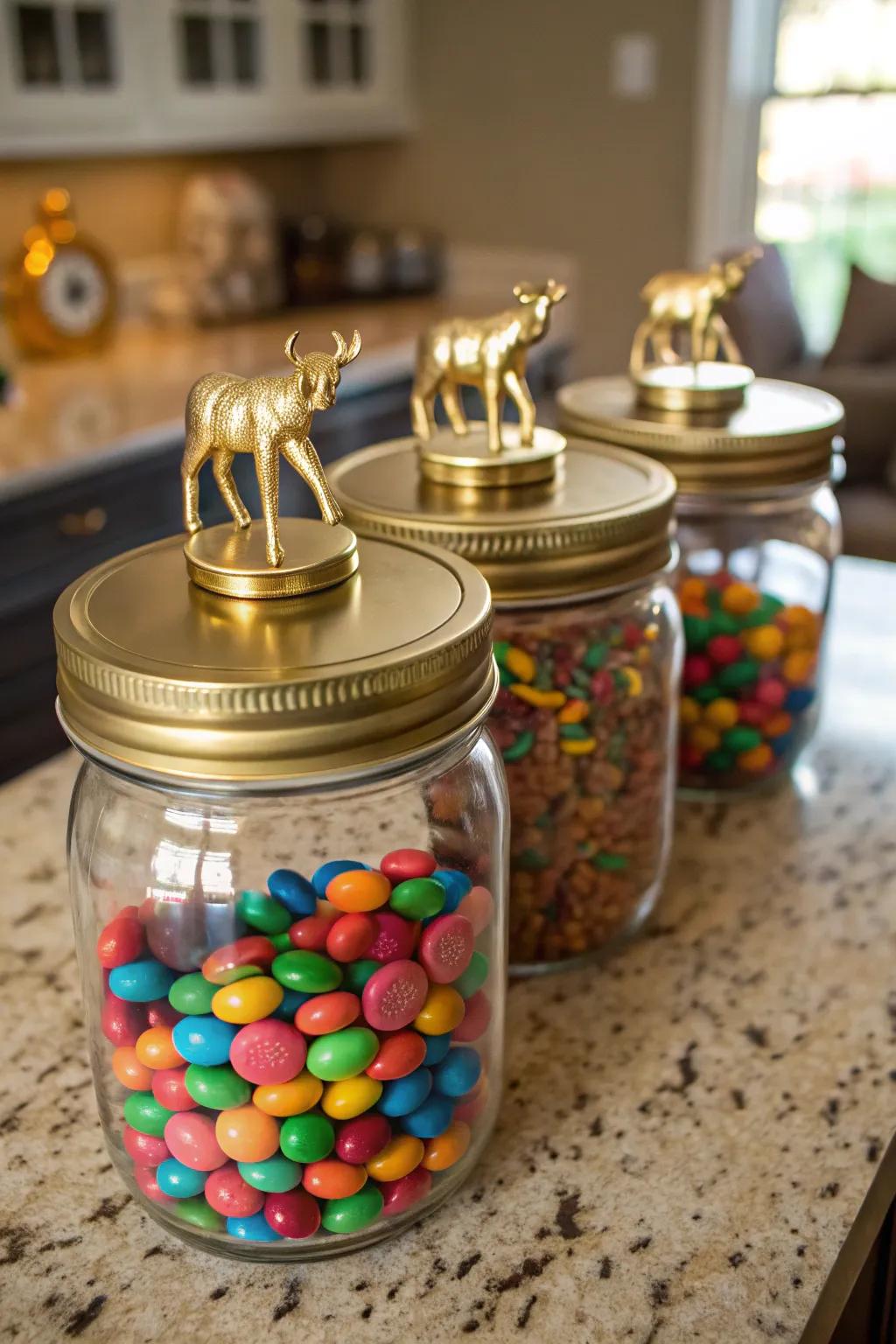 Gold-painted animal treasure jars filled with colorful candies.