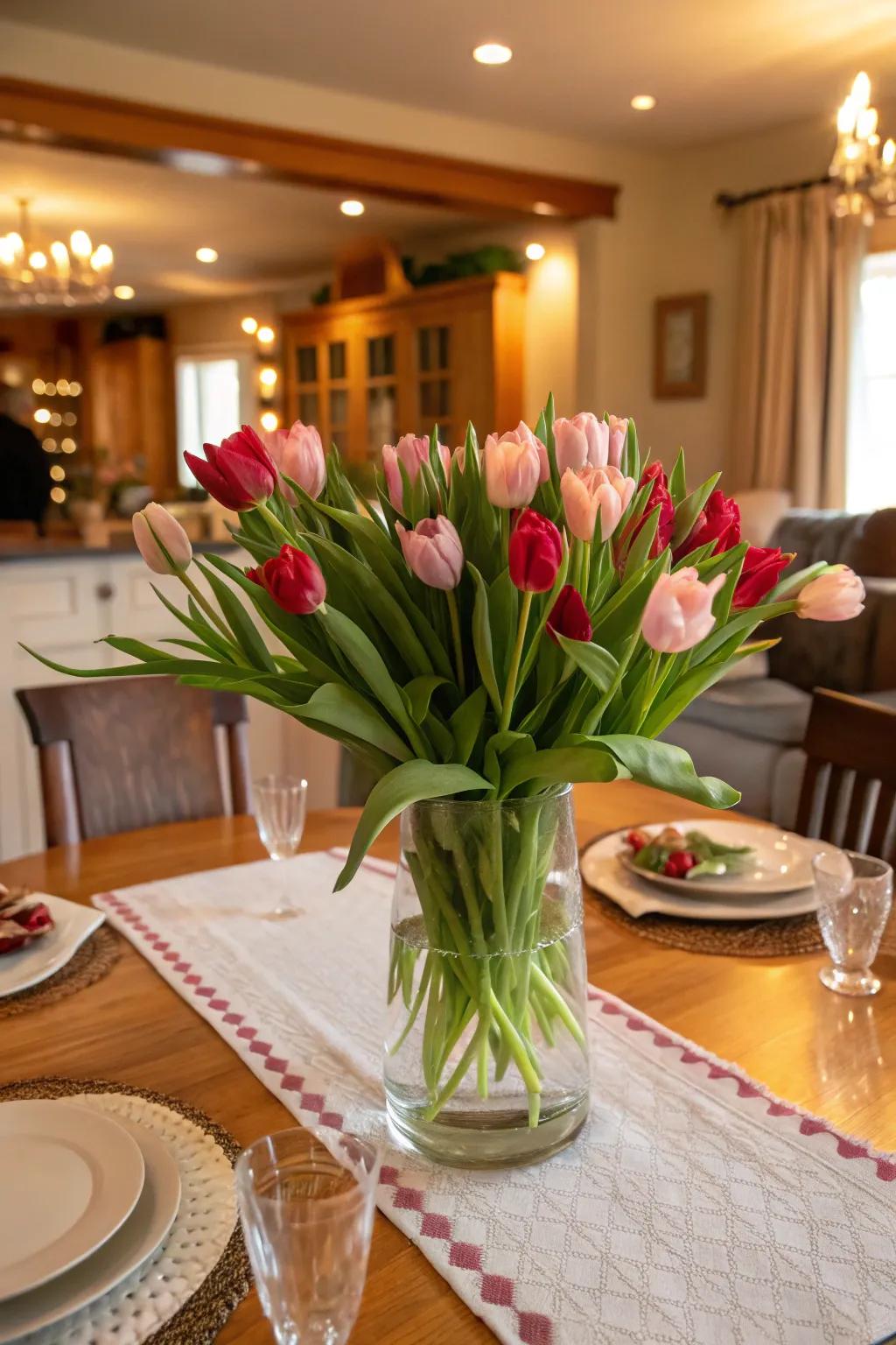 A dining table adorned with a vibrant bouquet of tulips, adding a fresh and elegant touch.