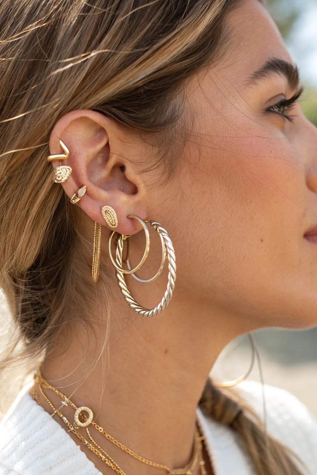 Elevate your style with a chic layered hoops look – where simplicity meets sophistication.