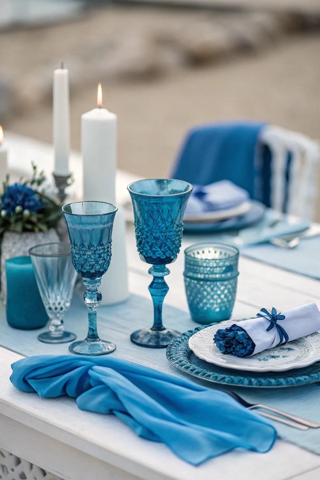 Elegant monochrome cocktail table decor in various shades of blue.