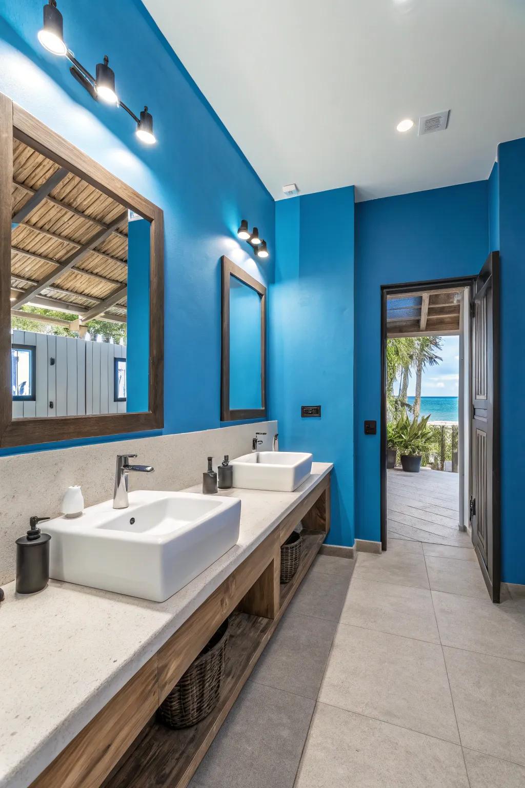 Bold blue walls add a touch of drama to this guest bathroom.