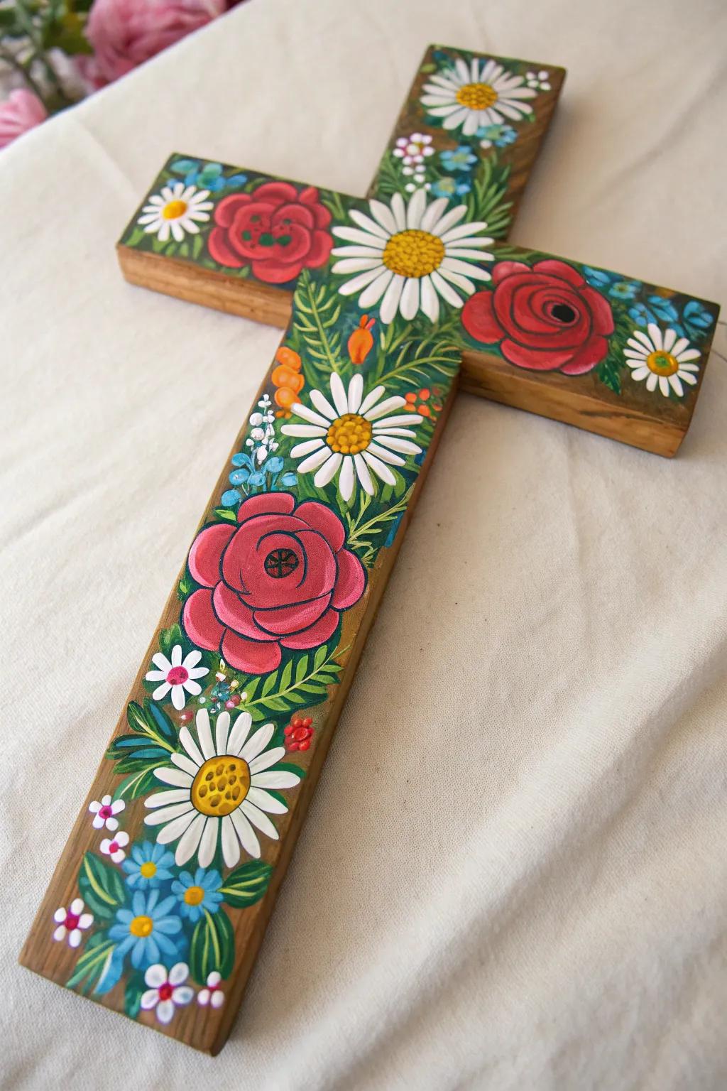 Bring a burst of wildflower beauty into your home with this hand-painted floral cross.