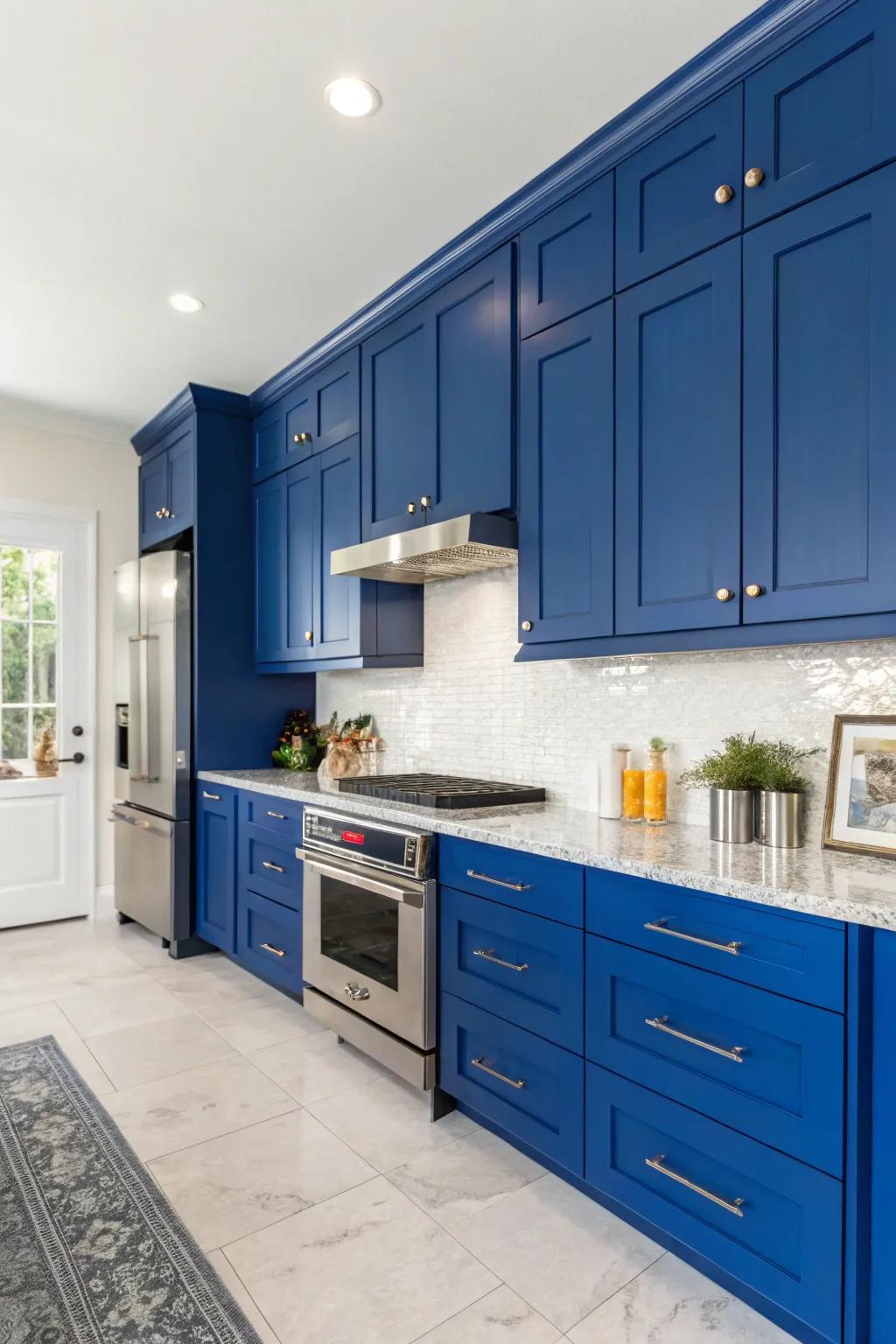 A chic kitchen featuring bold sapphire blue cabinets.