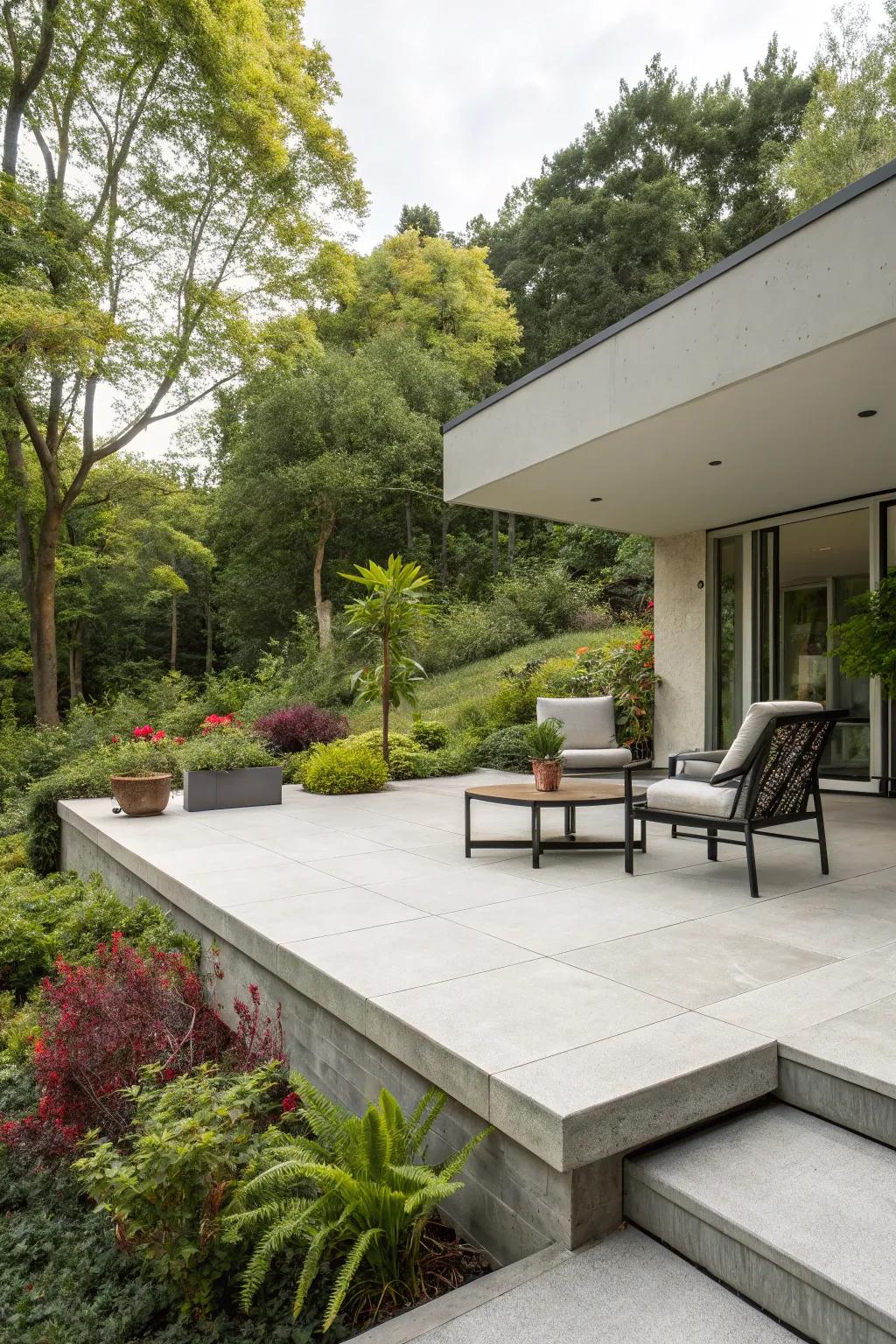 A minimalist raised concrete patio that offers a tranquil retreat in any backyard.