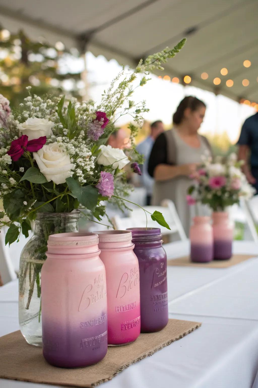 Ombre-painted mason jars provide a sophisticated and colorful centerpiece.