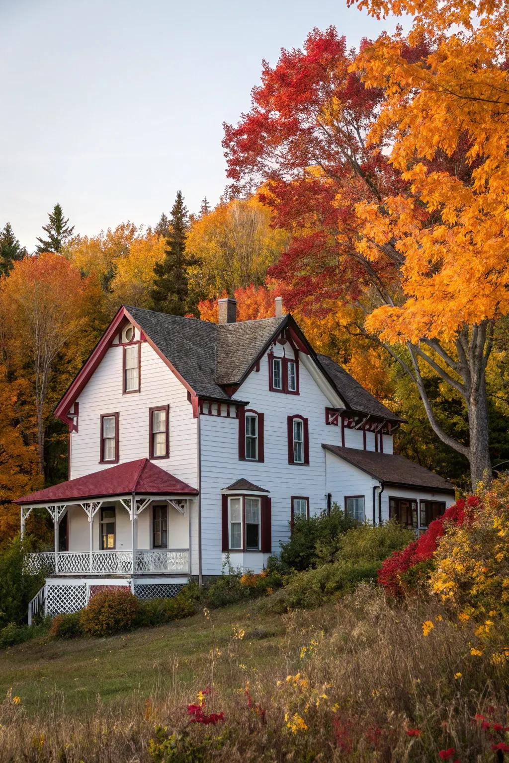 Burgundy trim adds depth and sophistication to this elegant white home.