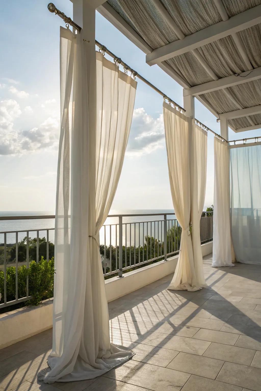 Outdoor curtains add elegance and functionality to your coastal balcony.