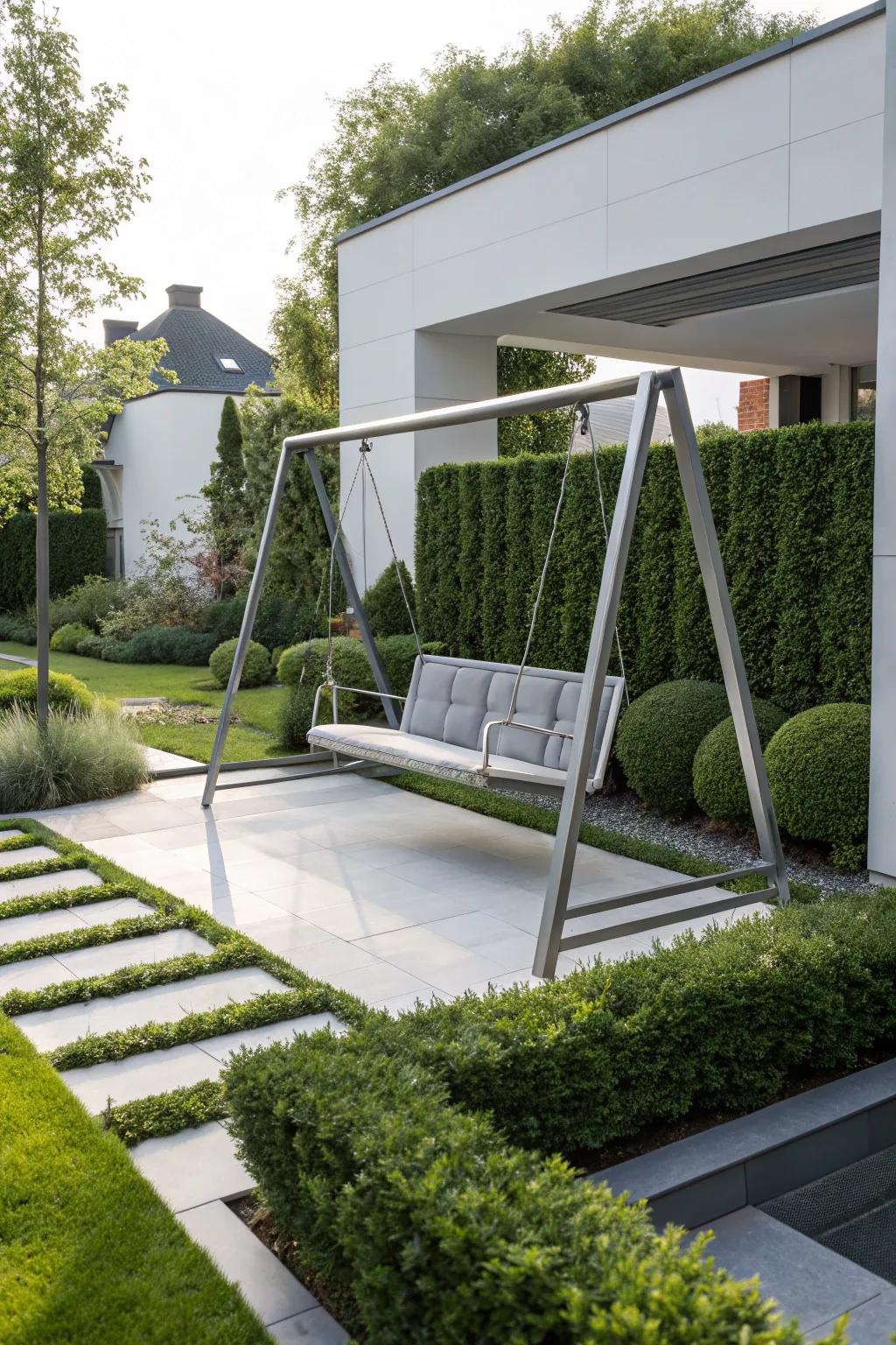 A modern metal frame swing, complementing contemporary garden aesthetics.