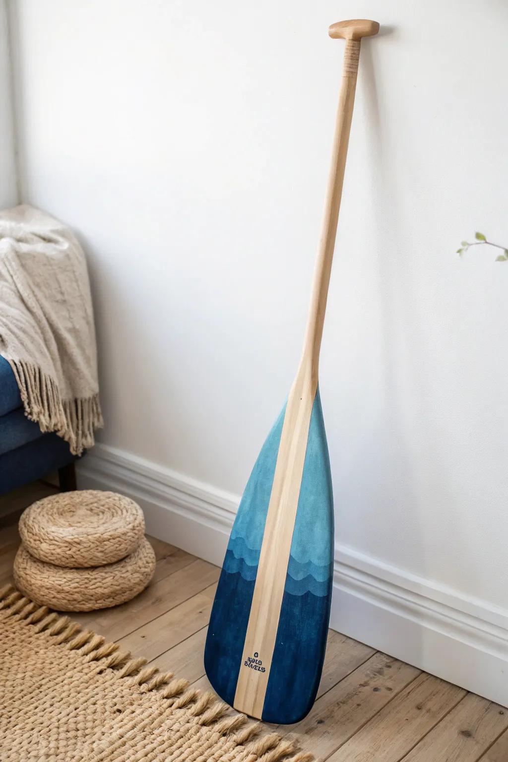 Transform your space with the serene beauty of gradient hues in a handcrafted canoe paddle.