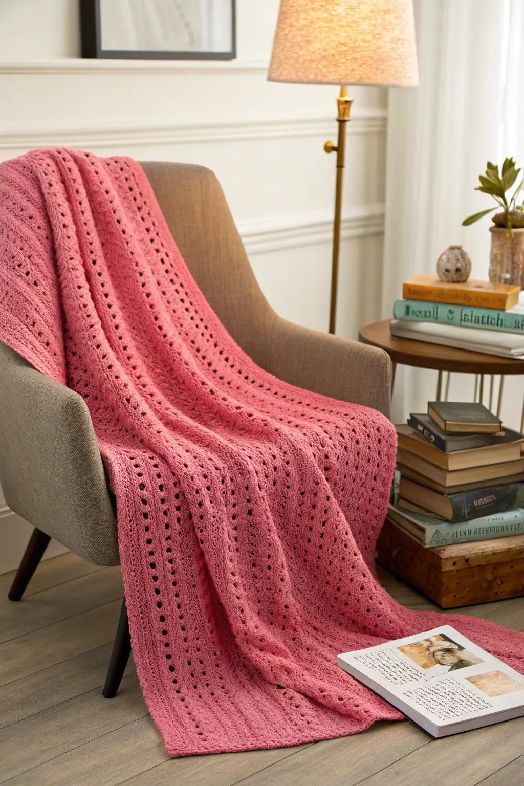 Add an extra layer of comfort with a charming pink crochet throw.