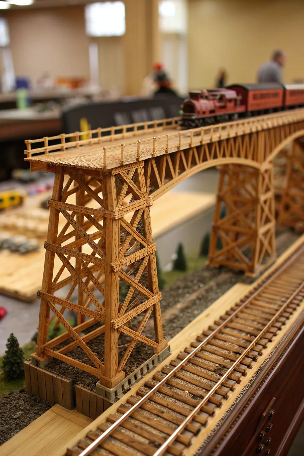 Master the art of miniature engineering with this stunning popsicle stick railroad bridge.