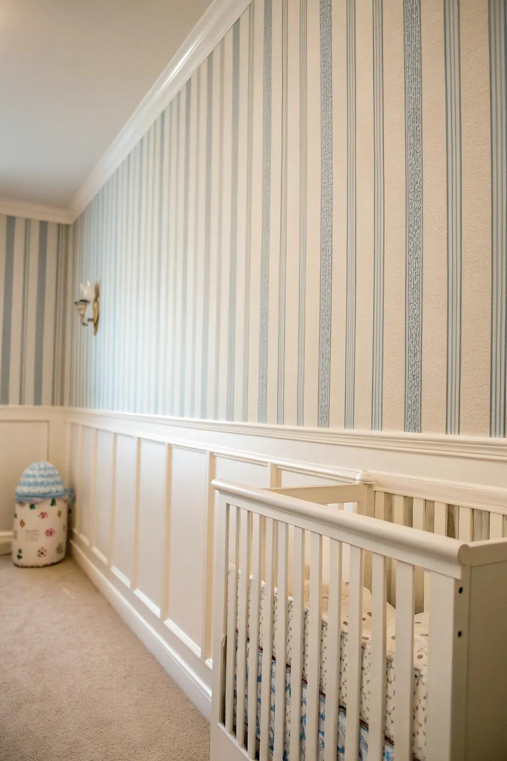 Vertical stripes in decor can make a small nursery feel taller and more sophisticated.