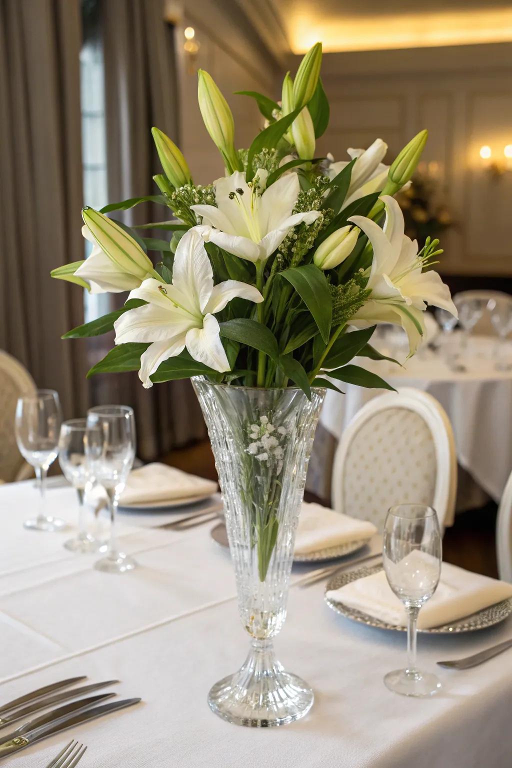 Luxury and elegance with lilies in a crystal vase.