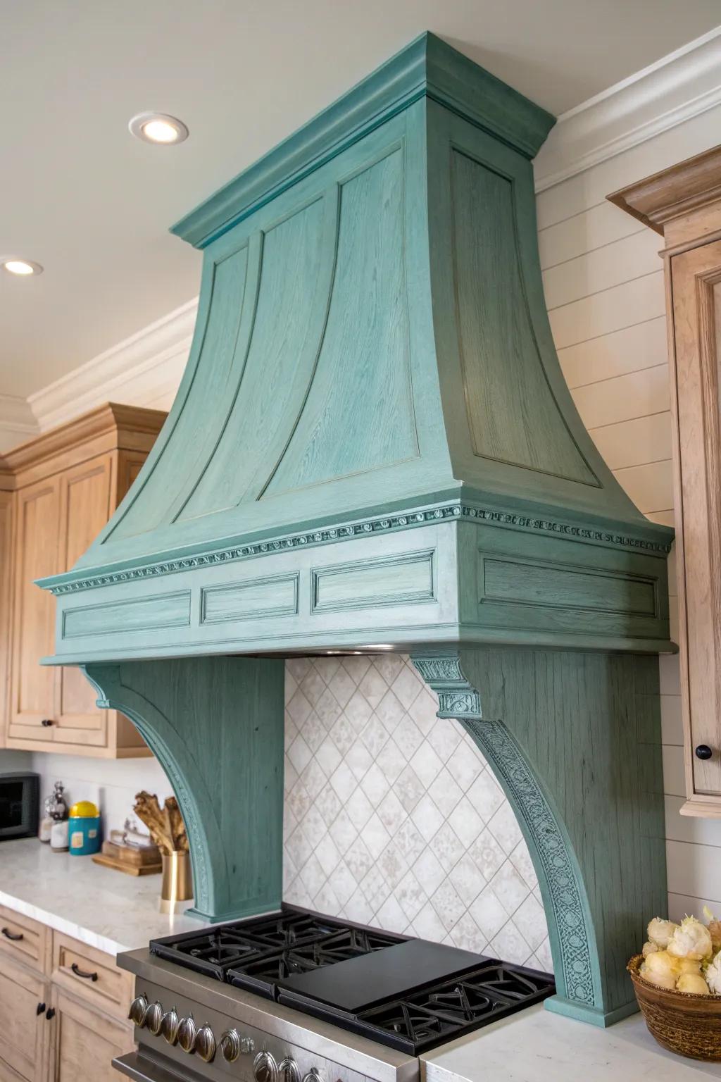 Add a bold twist to your kitchen with a handcrafted, teal-painted wood hood.