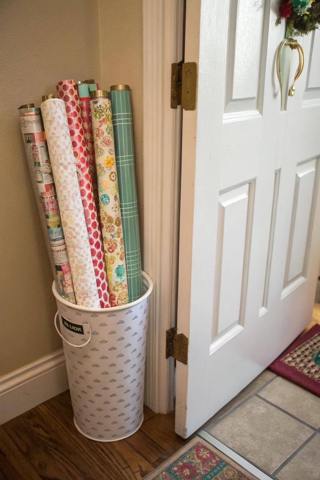 Trash can cleverly holds wrapping paper rolls.