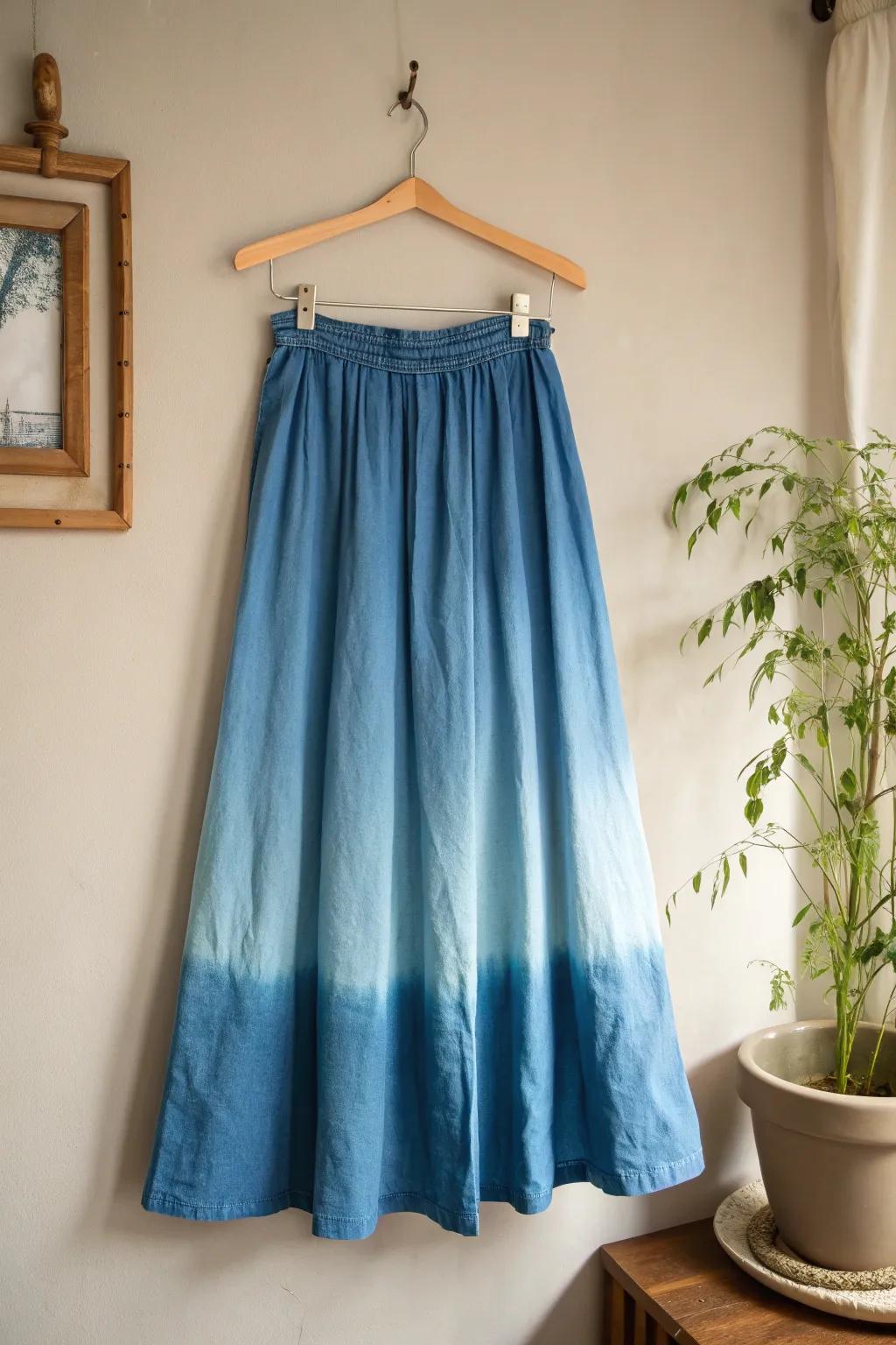 Transform your wardrobe with this stunning blue ombre dip-dye skirt – a perfect blend of simplicity and summer elegance.