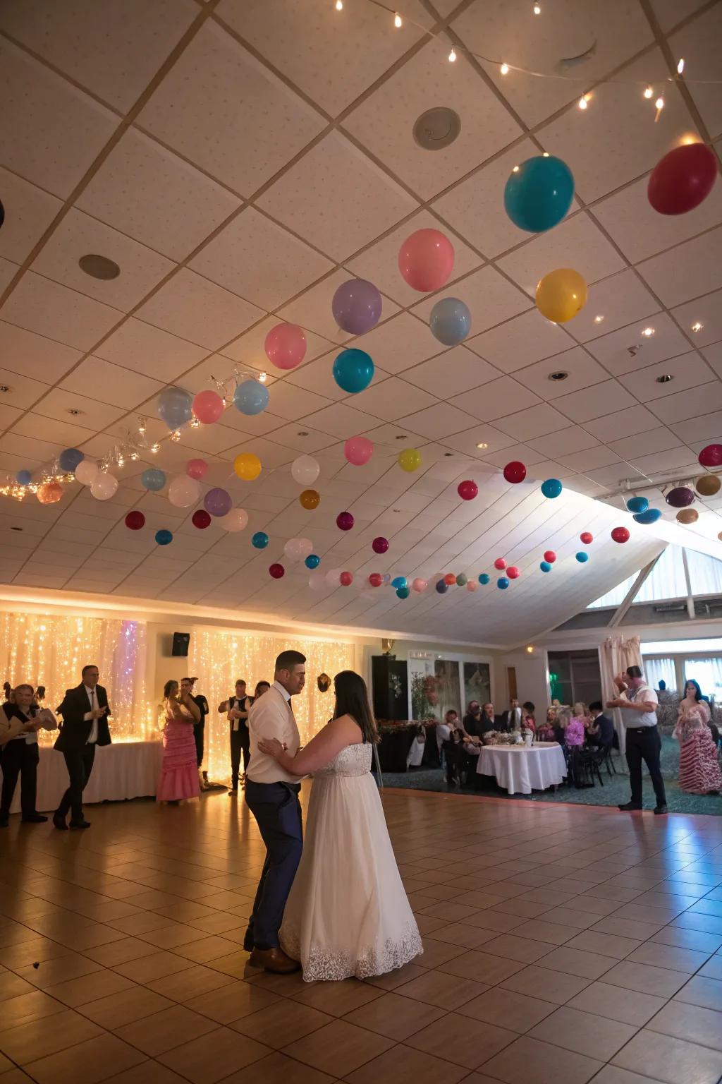 Add fun and color with a ceiling full of balloons.