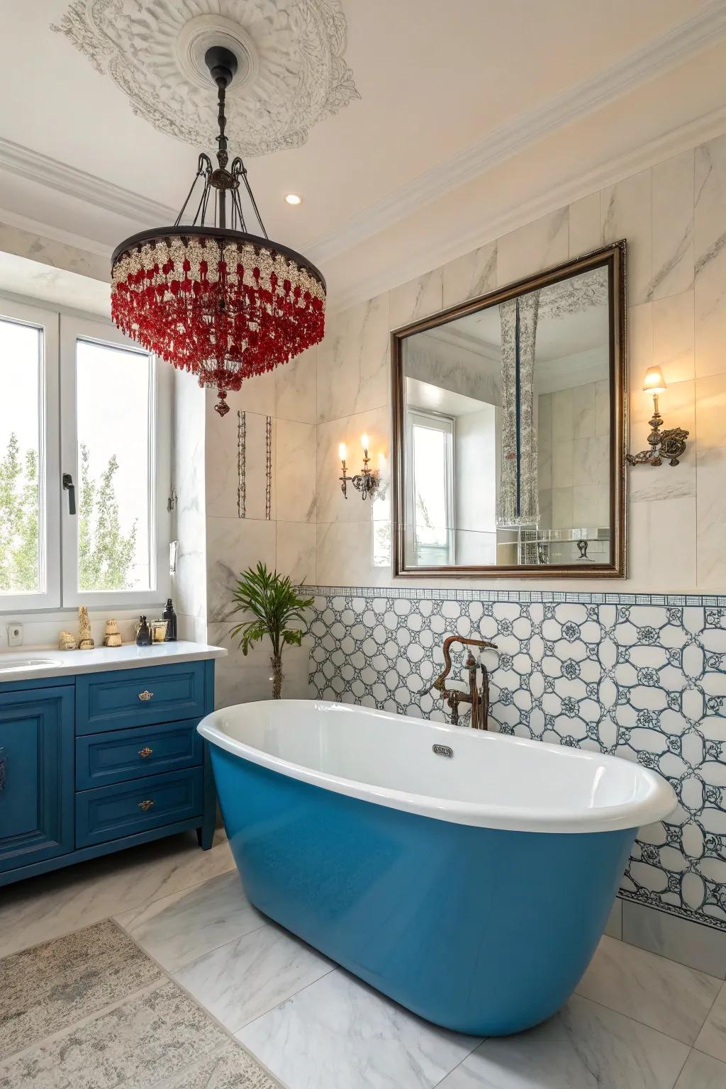 A statement chandelier adds elegance and drama to a blue bathtub space.