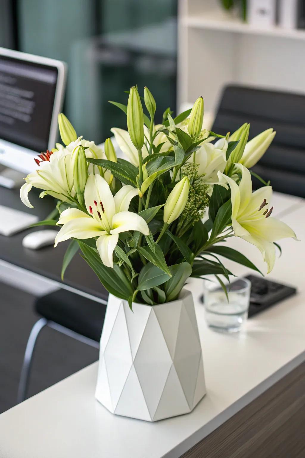 Contemporary chic with lilies in a geometric vase.