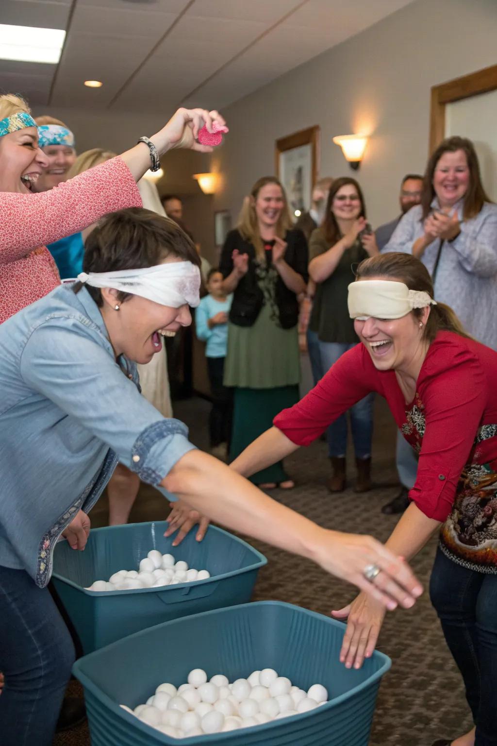 The Scoop the Cotton Balls game brings fun and laughter to the party.