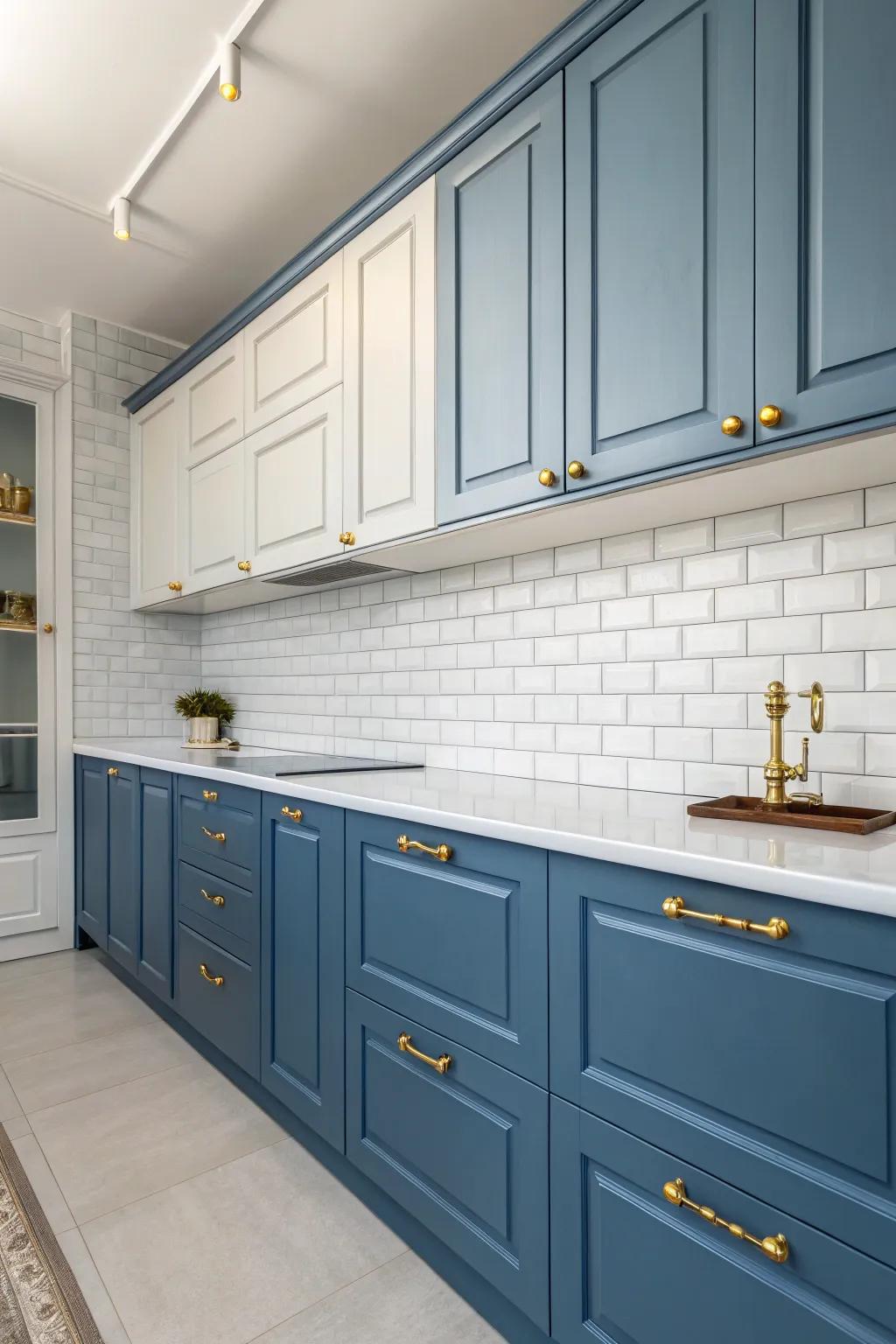 Varying shades of blue with gold hardware create a cohesive and sophisticated kitchen.