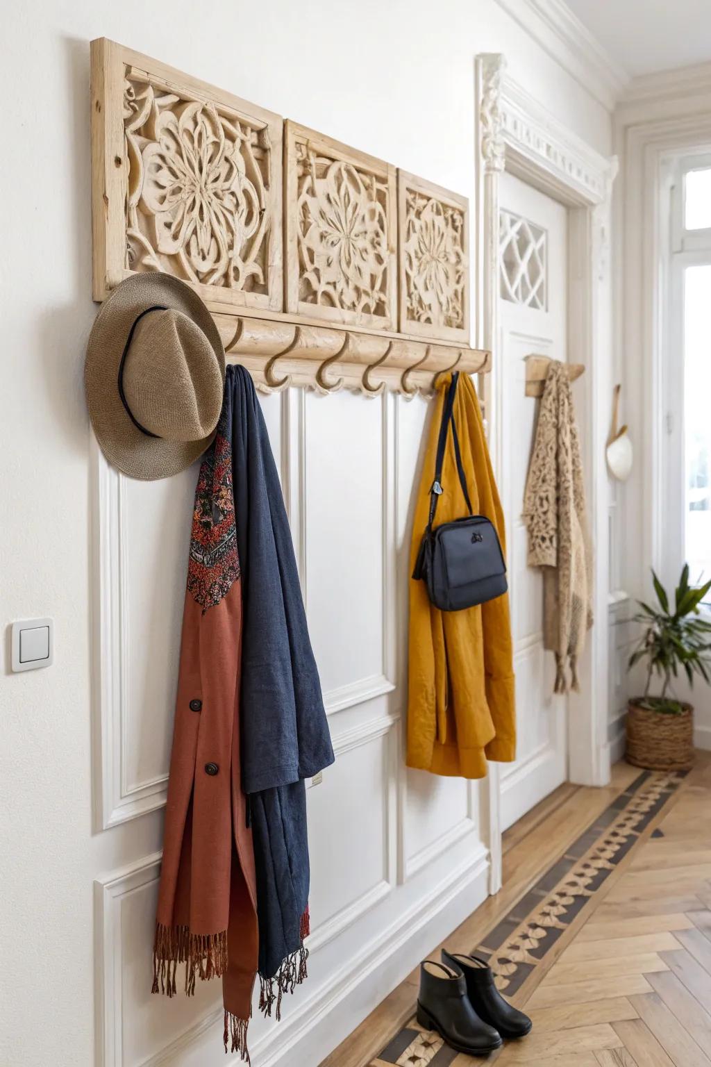 Transform your entryway with artistic hooks that blend Scandinavian simplicity and bohemian flair—perfect for a chic and welcoming space!