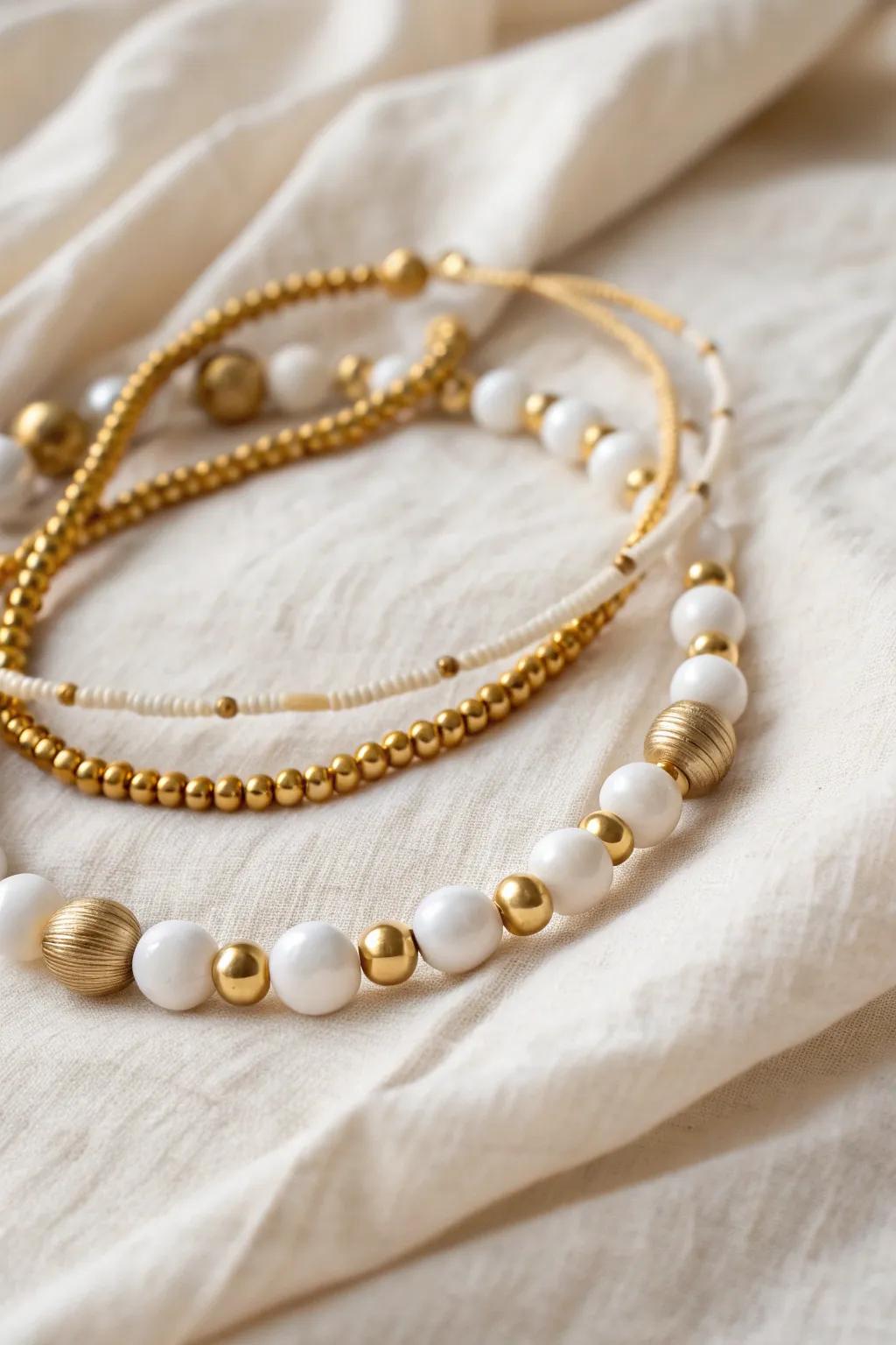 Elevate your style with the warm glow of gold accents in a minimalist memory wire necklace.