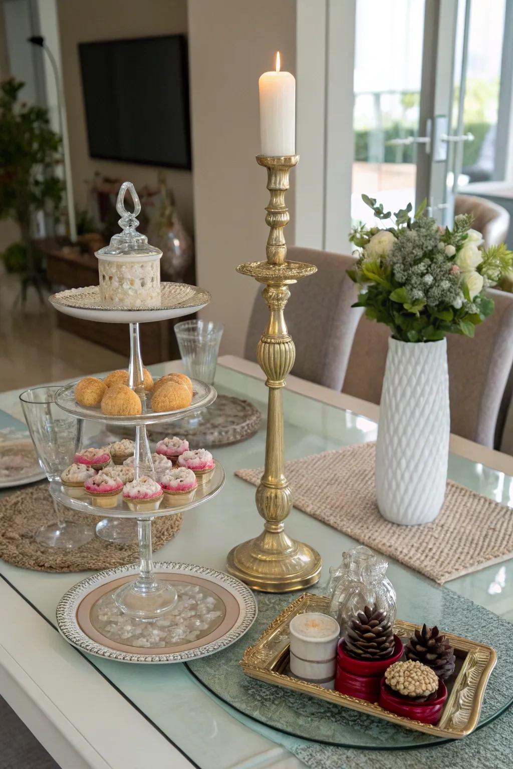 Height variations in decor create an interesting visual dynamic on a glass dining table.