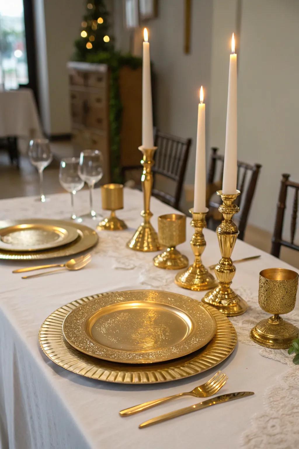 Metallic gold chargers and candlesticks add glamour and shine to the table setting.