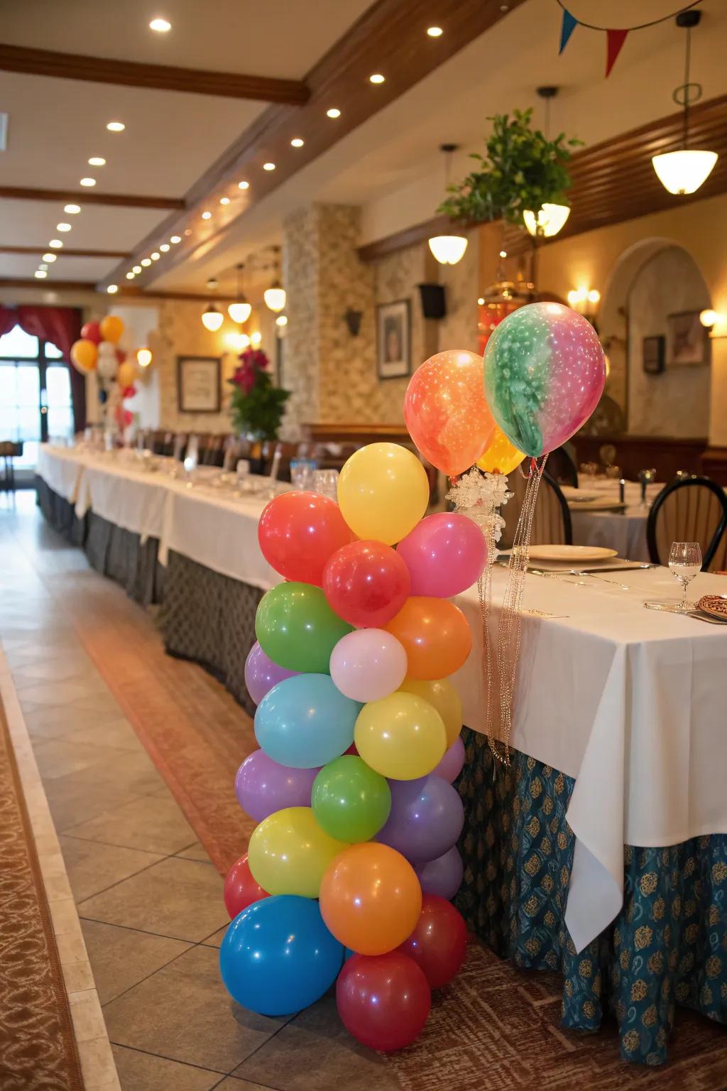 A colorful balloon runner that adds texture and vibrancy to a birthday table setting.