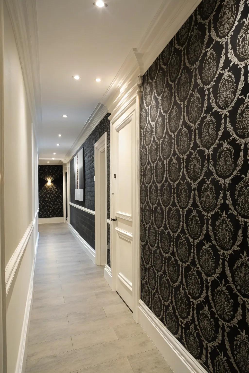 Black patterned wallpaper adds textural interest to this hallway.