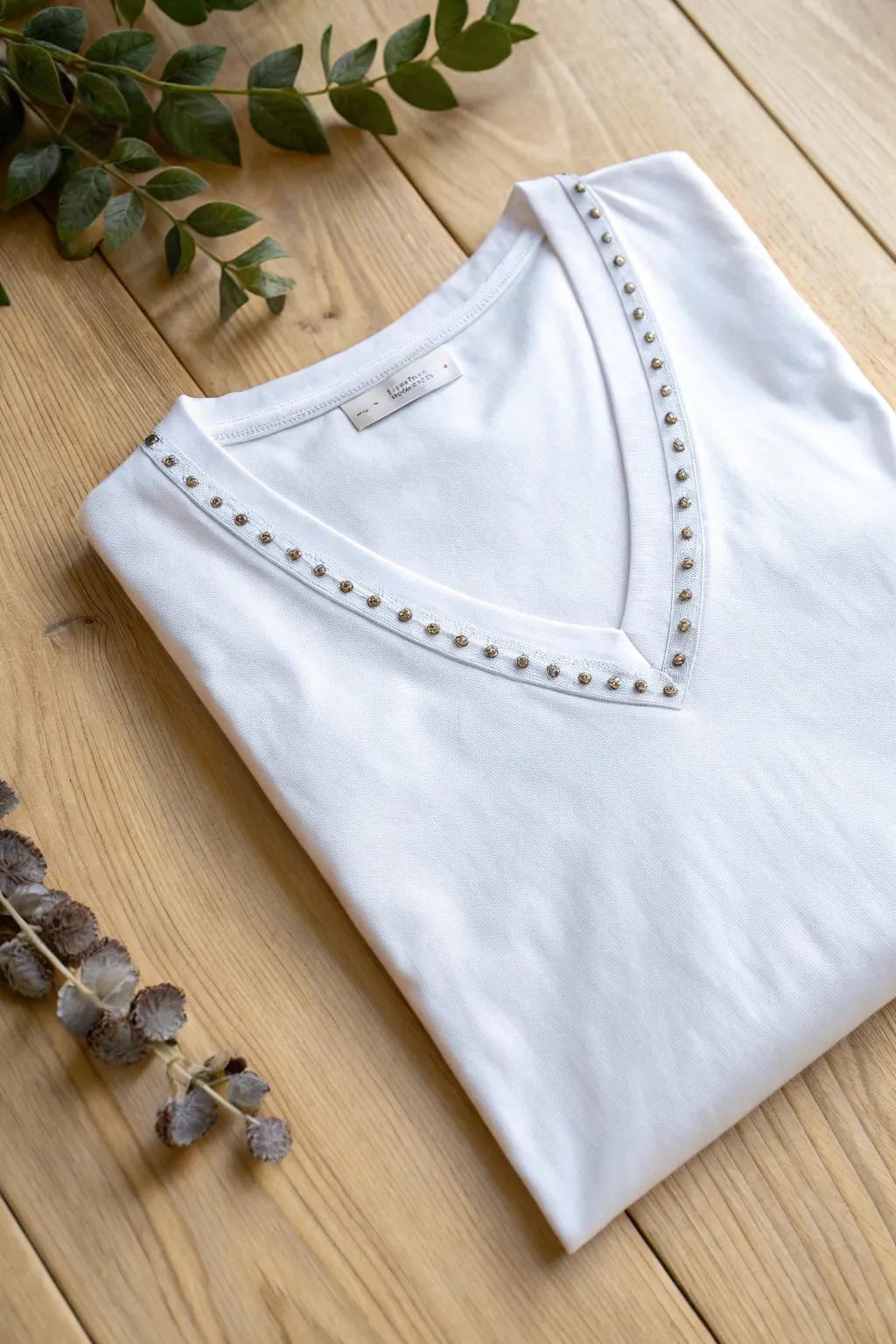 Elevate your style effortlessly with a studded V-neck t-shirt—perfect for a chic, rocker-inspired look!