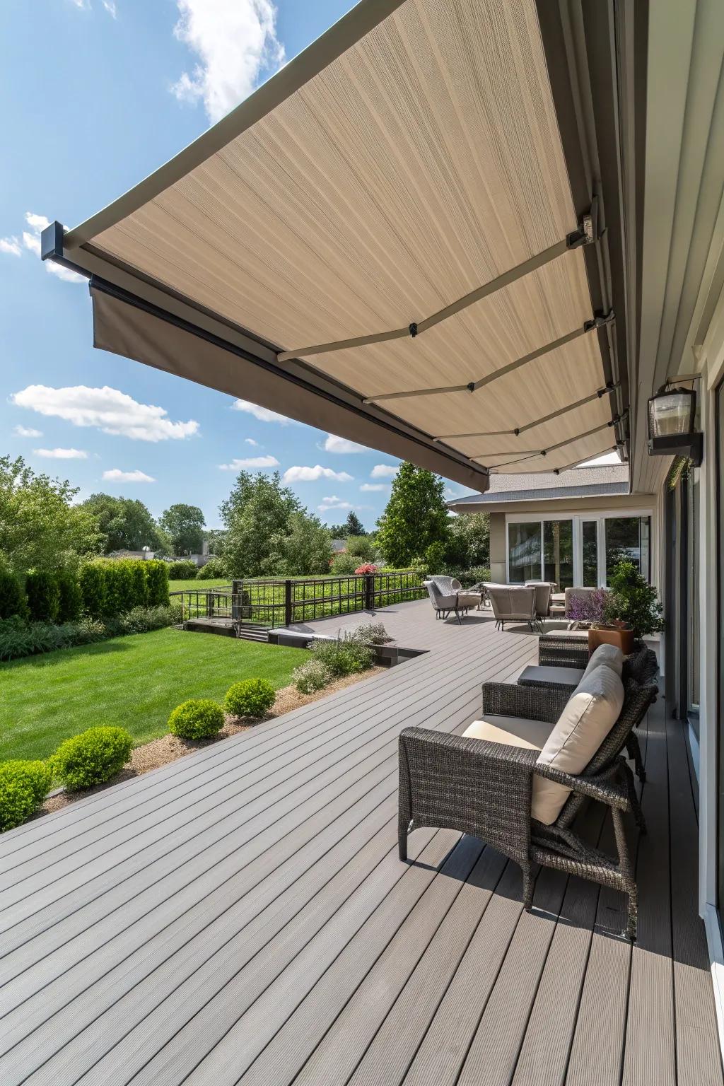 A composite deck equipped with a retractable awning for comfort and style.