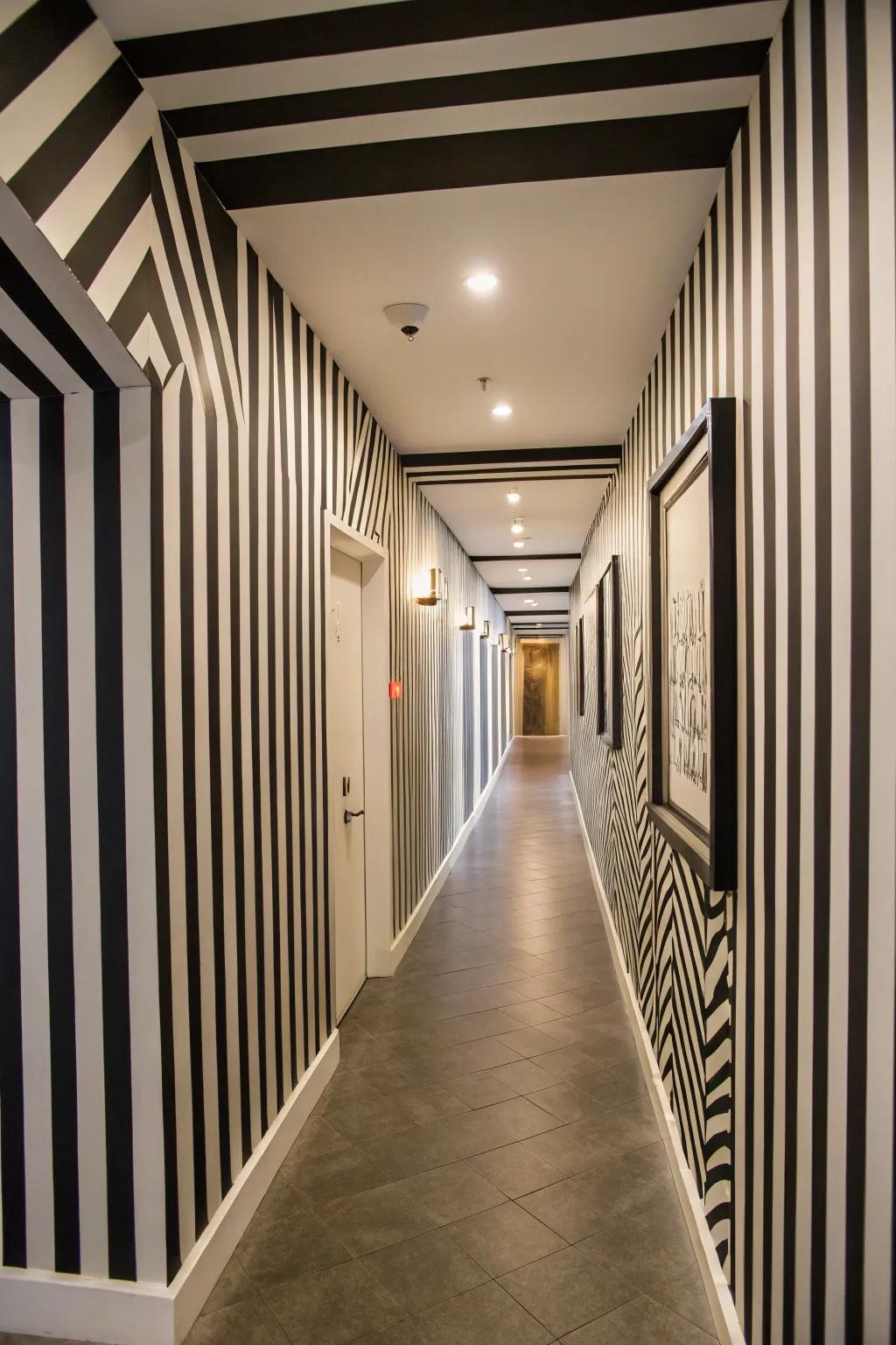 Black and white stripes add a dynamic look to this hallway.