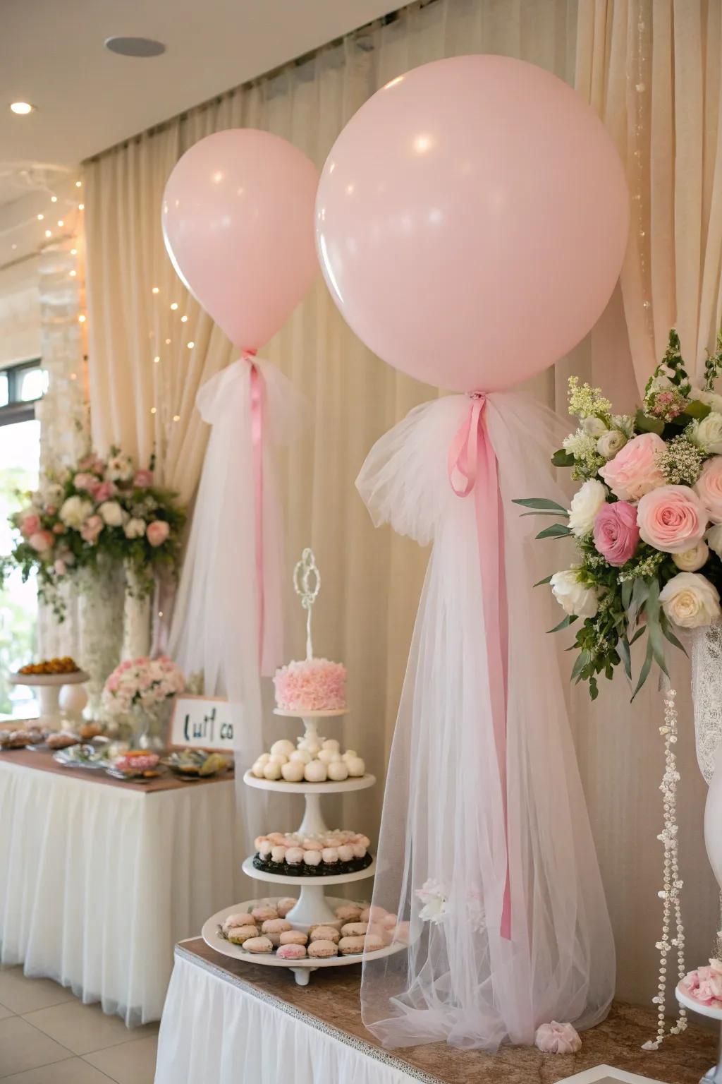 Add a delicate touch with tulle-wrapped balloons.