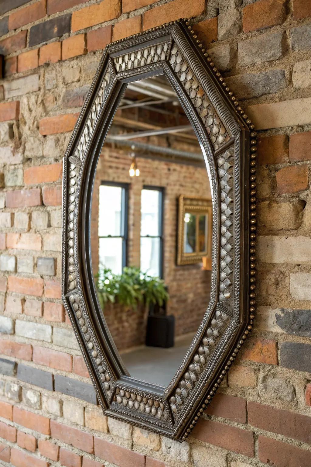 A statement mirror adds depth and reflects light beautifully against the brick wall.