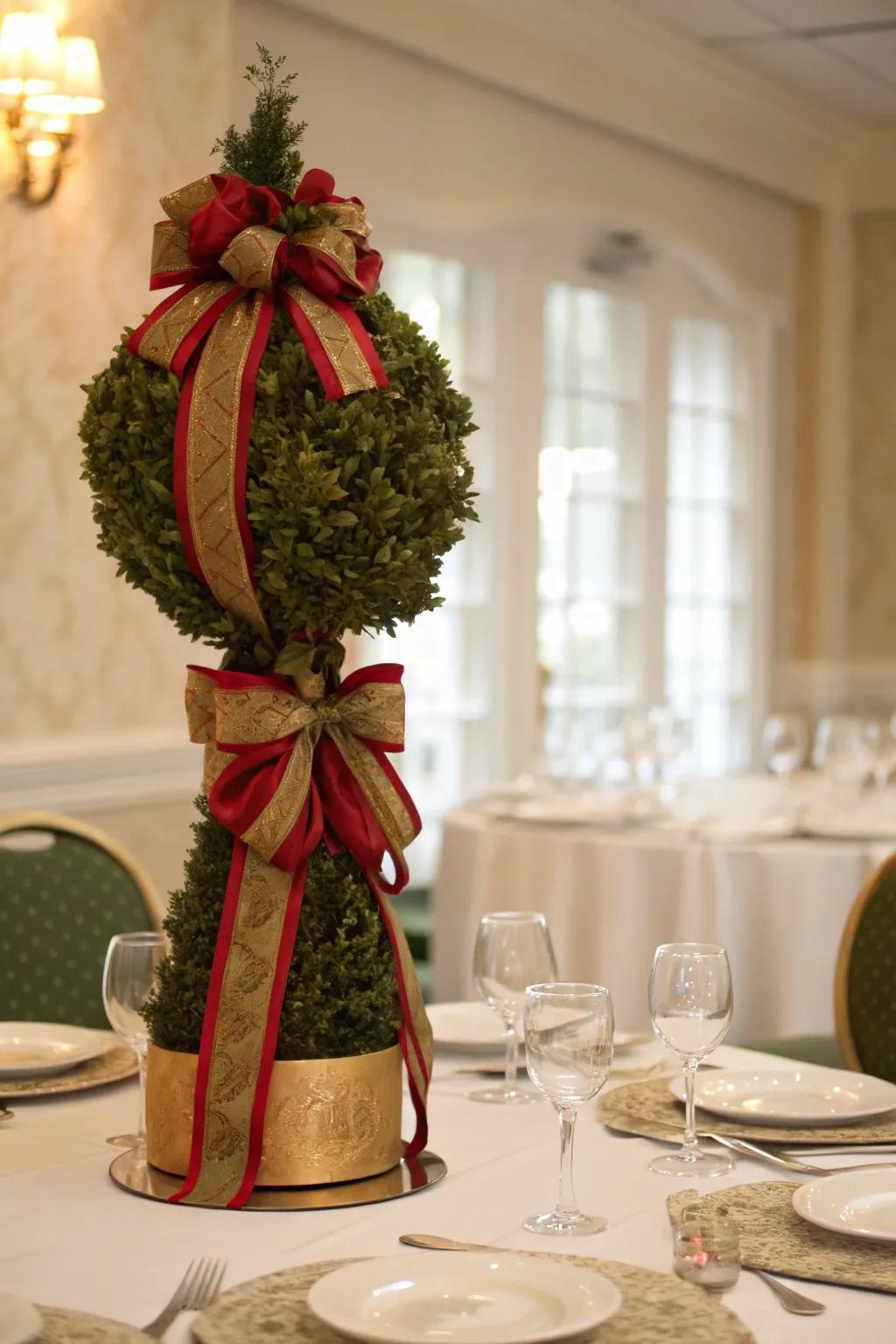 An elegant ribbon topiary adding sophistication to a formal dining setting.