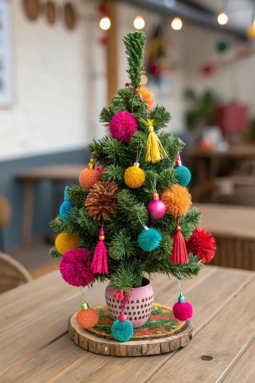 A playful mini Christmas tree with pom-poms and tassels.