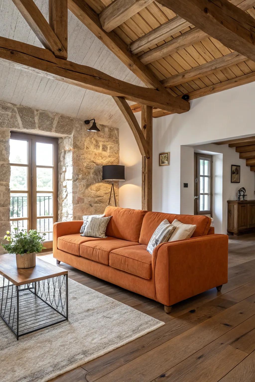 A stylish living room where rustic and modern elements blend around an orange couch.