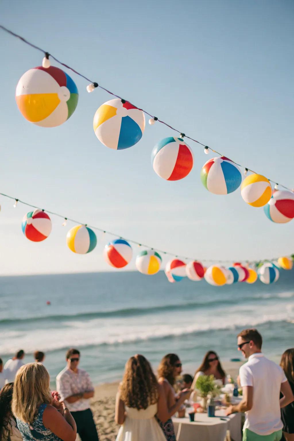 A vibrant beach ball garland adding a playful touch to the party.