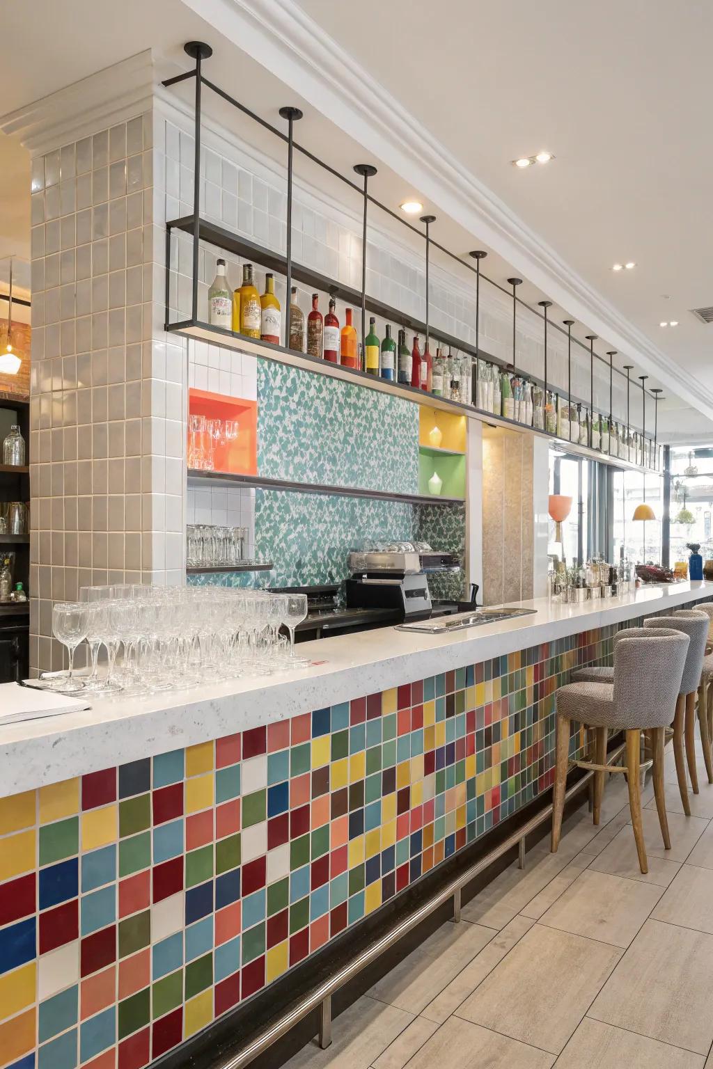 A salon bar featuring a multicolored mosaic tile backsplash.