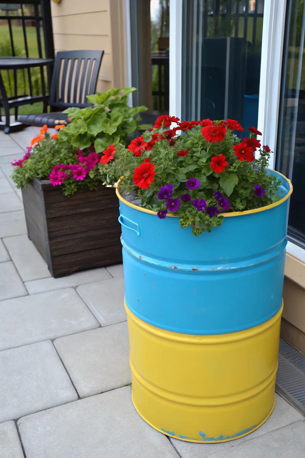 Transform your patio with vibrant, repurposed drum planters for a splash of color and creativity!