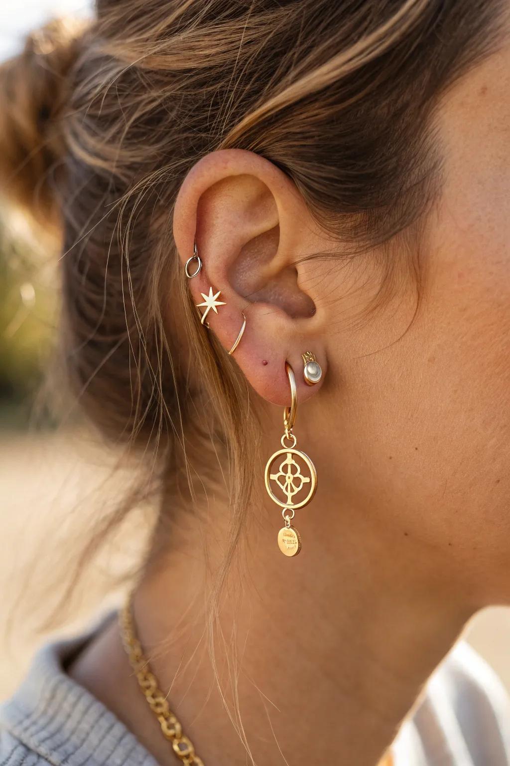 Embrace your story with personal symbols that speak to your soul. #EarPartyElegance