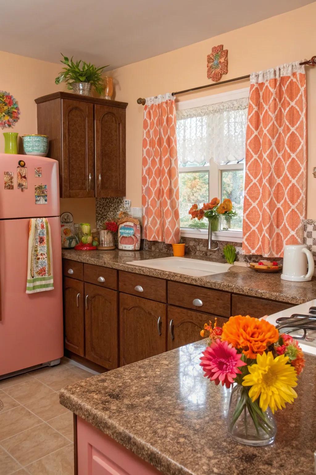 Light coral walls create a cheerful ambiance with brown granite countertops.