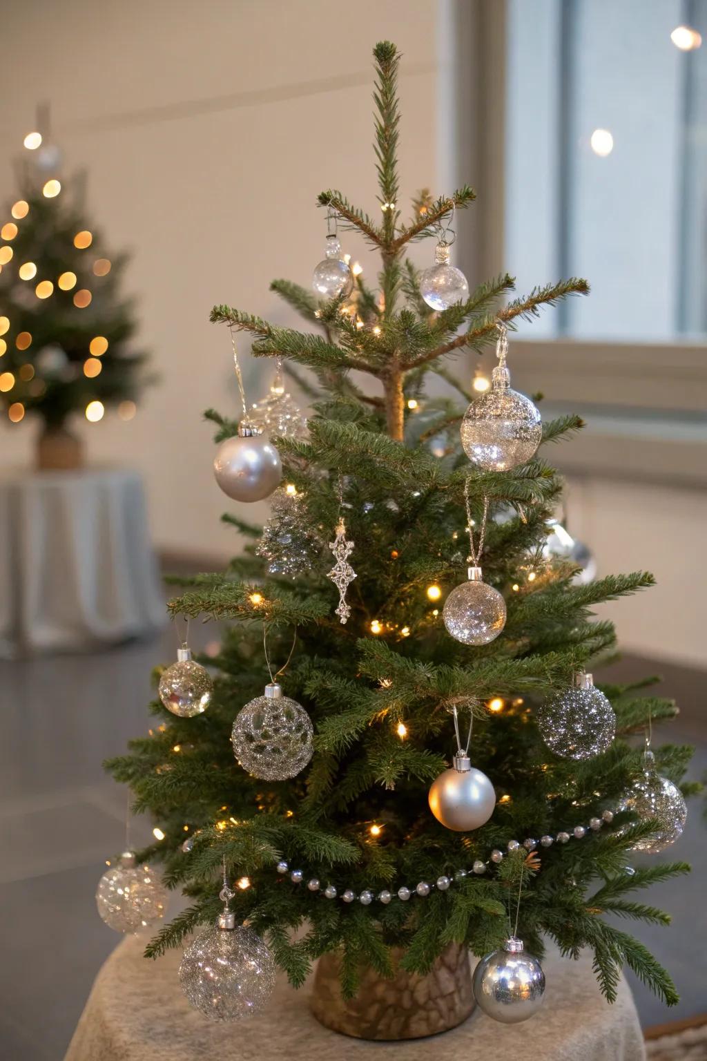 An elegant crystal and glass-themed mini Christmas tree.