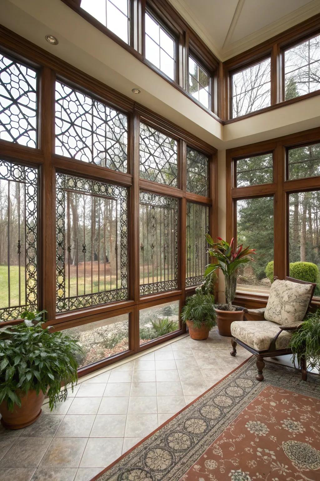 Sunroom with picture windows adorned with elegant decorative grilles.