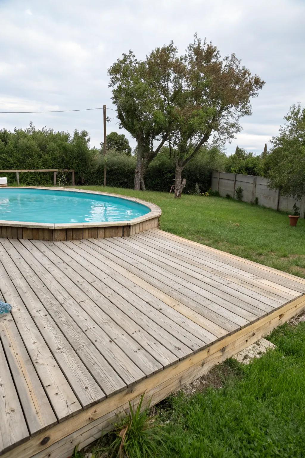 Wooden slats are a timeless, adaptable choice for any pool deck.