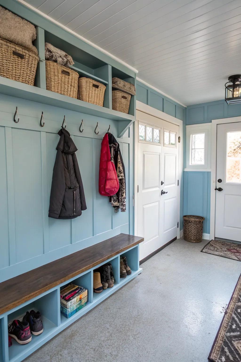 A splash of soft blue paint brightens up a garage mudroom.